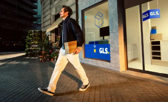 GLS delivery driver in front of ParcelShop